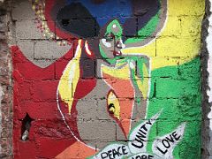08B Flower Child - Peace, Unity, Hope, Love, Joy mural by Deon Simone Water Lane Street Art Kingston Jamaica